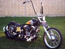 1st version. Stupid 18'' Ape hangers...Have NO control with that shit, No splitting lanes &amp; can't park or turn around where ever you like. Useless....