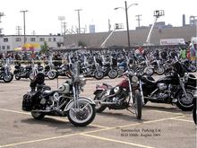 E pluribus unum- The H-D 100th Anniversary, 4-day bash, brought bikes and bikers from around the world! Unlike any other bike rally I have eve been to in the past 36 years, I met 'bikers' from all over the world, some whose only English was "Harley-Davidson"! Here is Sweet Freedom, parked among the tens of thousands of Harleys, outside of the Summerfest grounds at Lincoln Park in Milwaukee.