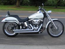 With the Heartland 180 rear wheel / low profile tire and the lowering job I did to it, she can be a little rough through the dips, but handles like a rock star.