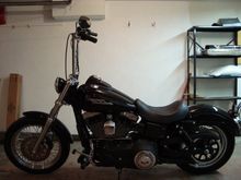 street bob lowered
added 11" progressive shocks
powder coated the strut covers
integrated brake light with rear turns.