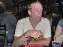Tom doing what he is best at...stuffing his mouth. LOL.