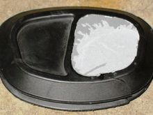 Making a grommet plug using JB Weld.  Info here: http://www.hdforums.com/forum/dyna-glide-models/165942-cleaning-up-the-wire-harness.html