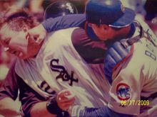 Chicago Cubs catcher Michael Barrett slugging the White Sox catcher A.J. Pierzynski!