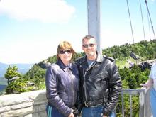 The Wife and I next to the Mile High Swinging Bridge/July