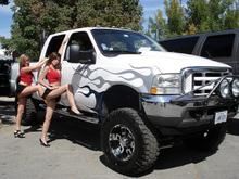Some girls from a local strip club posing by my truck at the Indy 4X4 Jamboree