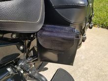 Custom made Puck Holster mounted on Saddlebag Guard