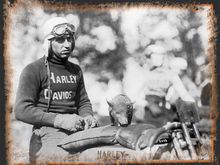 Lawrence Ray Weishaar (September 9, 1890 - April 13, 1924) was a Class A Racing Champion in the 1910s and 1920s. He rode for the Harley-Davidson 'Wrecking Crew,' and helped to popularize the nickname 'hog' in reference to Harley-Davidson by carrying the team's mascot, a small pig, around on victory laps.