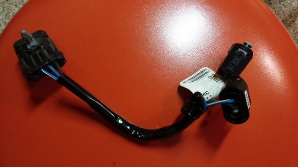 This is the splitter that is already on the 2014 Touring bikes with the halogen bulbs.