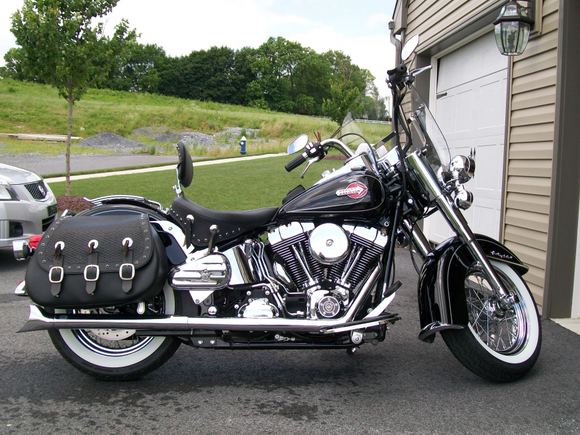 Added HogDeluxe springer style bags and HD retro tank badge