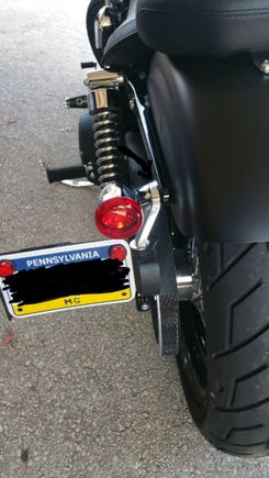 Cant i just take the liscense plate bracket off and put the turn signal back where the plate bracket was?