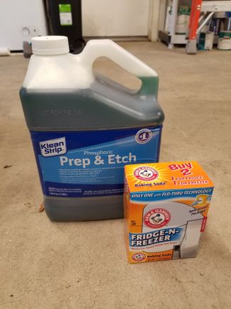 After draining the phosphoric acid out, I neutralized the tank with a healthy amount of baking soda and water.