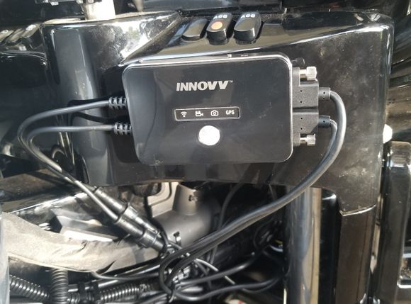 Easy access to DVR to remove SD Card when HB's turned to fra left.  If you look closely you can just see a little bit of the power module attached to the bikle frame with automotive high strength double stick tape tucked behind the main wiring harness. 