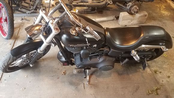 The ladies 2007 street bob, which i have to maintain and buy shit for 😟 even though she knows how to work on them lol.Oh well she has the vagina and i dont so i dont make the rules.