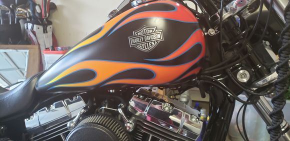 The temp on my 2015 Dyna wide glide on a 90 degree day would be 270 to 280 with no tank lift.
So, I installed this 2 1/2" tank lift and took it out for a try.
When i got back from a 45 min ride. The temp was reading 270 degrees. That was from the constant temp read from my Vance and Hines FP3. 
Intake air temp was reading 145 deg with The Arlen Ness Big Sucker air cleaner.