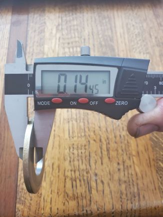 FSM says this alternator rotor spacer should measure 0.055" but the one in place is 0.145"