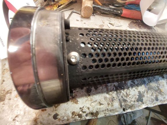 Vance and Hines Quiet Baffles go in VERY easy.  Holes are already there and come with the nuts.  Just screw em in. 