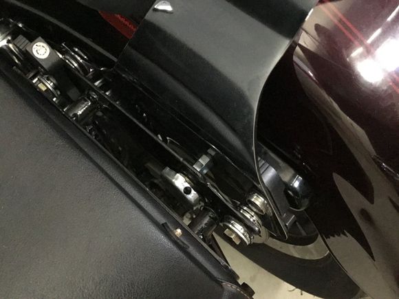 The knobs are hex shaped so I drilled holes in every other side.  The knobs are safety wired to the mount, that is bolted to the bags, so even if they totally unscrewed on the road, I would not lose them, nor would the bag come off.  It would just flop a bit.