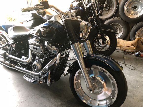 Added Willie G floorboards, brake, and clutch pedals.  HD mustache bar engine guard, and a new black HD nacelle (the cover around the headlight). I really like the black nacelle, it flows better with the black paint visible from the side of the bike and the chrome headlight trim makes it pop. 