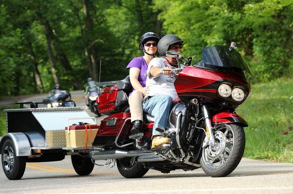 Balance your load properly, stay within load capacity, adjust braking distance, remember your extra length at the gas pump [another story for another time]. Go enjoy the sights and sounds!