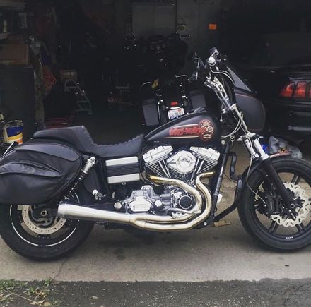 My bike. Maybe it’ll give you an idea on where you want to proceed

13.25 shocks
Nix22 fronts 
Dual disc conversion 
Twin galfer wave rotors
Speed merchant radial brackets with tokico rotors
Bassani rr3 
Brembo rcs19 11/16 master 
Big als 8” pullbacks with 3.5 inch bars
Saddlemen stepup seat 
Leatherpros all leather bags 