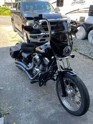 I’ll join in, 2008 fxdc with a frankenfairing. Memphis shades gauntlet with a laminar lip bolted on. Made my own .250” rubber shims for in between and covered that awful laminar lettering with black 3m reflective tape.