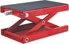 This is the type of scissor jack I was referring to. It's made specifically for bikes . Easy to use to do what you need and it's only about $80.