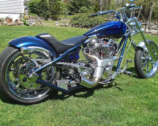 I know this is *off topic* and doesn't pertain to
 H-D wheels,but these were designed by ME on my MAC  CAD system computer,sent to *MILLENNIUM MACHINE & TOOL* in Salinas Kansas to be made from T6T USA Forged Aluminum and then Chromed and custom bearings installed on my 150 C.I. S&S 50th Anniversary Motor with BAKER DRIVETRAIN Transmission and complete primary .This is a ground up build with ZERO" Backbone Stretch and ZERO " up tubes to make the bike small and light .34 degree rake