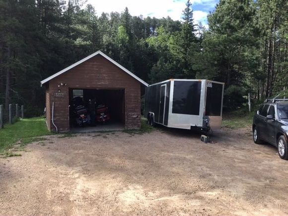 The garage and parking area.