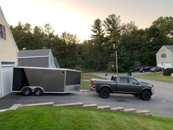 14’ EZ Hauler sloped v-nose snowmobile / motorcycle trailer. Dual torsion axles with brakes. Tows sleds and bikes like a dream. Headed out to Sturgis with it this year.