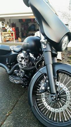 Do not have a clear pic of the house but as you can see, the "guard dog"  is where she usually lives when not on the road. Not as sexy as most on here but it does all I need. I could probably use a tire changer though.