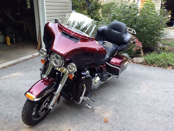 The day I brought her home, 9/20/14.  Bone stock and the only thing I've changed so far is the USMC timing cover I took off my Road King, and an adjustable rider backrest