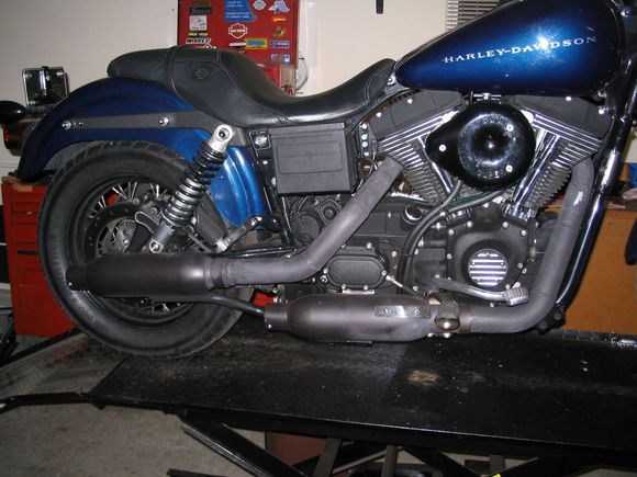 Stepped pipe with dynomax 2 1/4 in mufflers.