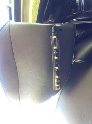 This pod of lights are under the arm of the backrest to illuminate the inside of the saddle bag.
