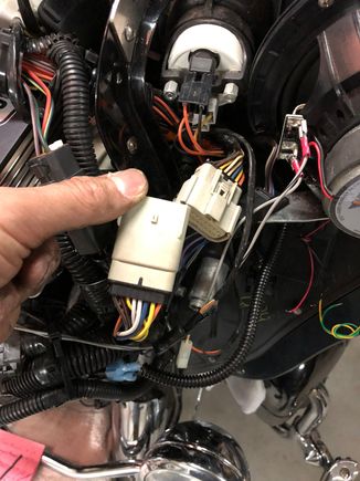 This is the connector to the right of the radio that I would pull the wires from to use the PTT switch.