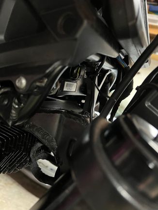 Wire coming down between fairing and instrument panel.