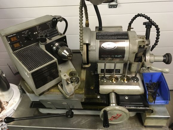 The whole home machine shop craze began innocently enough with the purchase of a small second hand drill press . I became frustrated with the state of things at work so I decided to buy my own cylinder head reconditioning equipment and it went on from there....