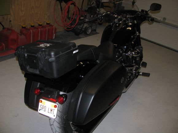 Tail pac comes on and off in 30 seconds or less. I have the HD tailpac lock on order - they are backordered till Jan 2018.