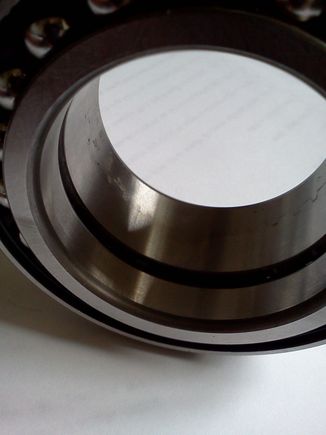 This is a double row bearing and as you can see it has a seperate race for each row of balls.