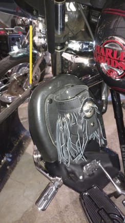 on my softail i just used a handlebar mount, turned it sideways and clamped it to the passinger foot peg
