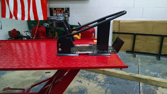 Harbor Freight wheel chock threw bolted onto steel deck
