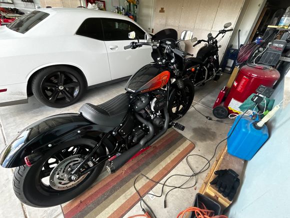 22  with Two Bros system, Thrashing Supply 9.5 risers, ODI Podium 1 tracker bars, HD Dominion pegs, Avon grips, Memphis Shades Road Warrior fairing and a cruise control (getting installed in the next week).
Traded in my 13 FLD w/124” kit for this. 
Do not feel any regrets. 👍