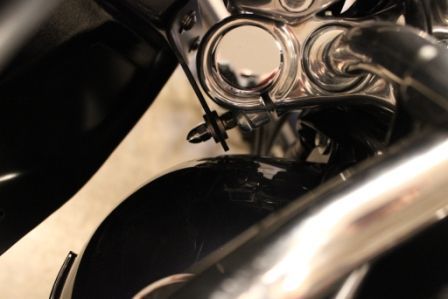 This is where test fitting the fairing mounting brackets is critical.  When I 1st installed the T-bolt clamps the bracket would touch my tank.