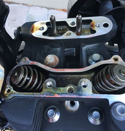 Cleaning off the old gasket material/residue took the most time. Look at that rusty bolt! - should I be concerned about that?