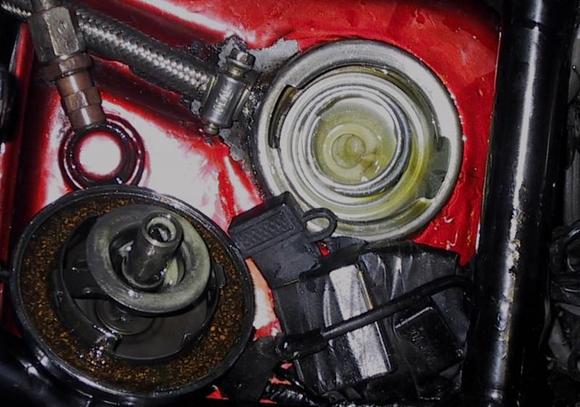 My oil tank. This is what happened to brand new 50wt oil after ideling my bike for 60 seconds