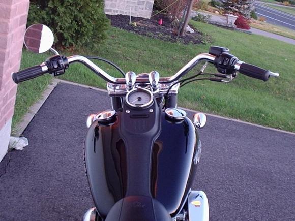Street Bob with Flanders Handlebars
http://www.sideroadcycles.com/AmericanMotorcycles/Handlebars/AmericanHandlebars.html
