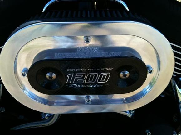 Hurricane flow, polished with stock Roadster emblem.