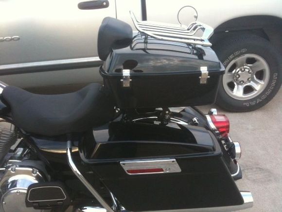 09 FLHT Standard with solo chopped tour pak.
Optional Air-Wing rack with LED light bar.