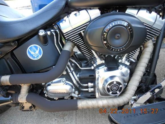 Stock exhaust wrapped, Cats removed and heat shields moded.