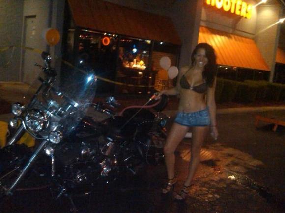 Another bike wash and the sanitation engineers who washed it at Hooters during Wednesday night bike night in Jacksonville.