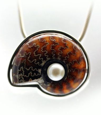 Ammonite shell and cultured pearl set in sterling silver